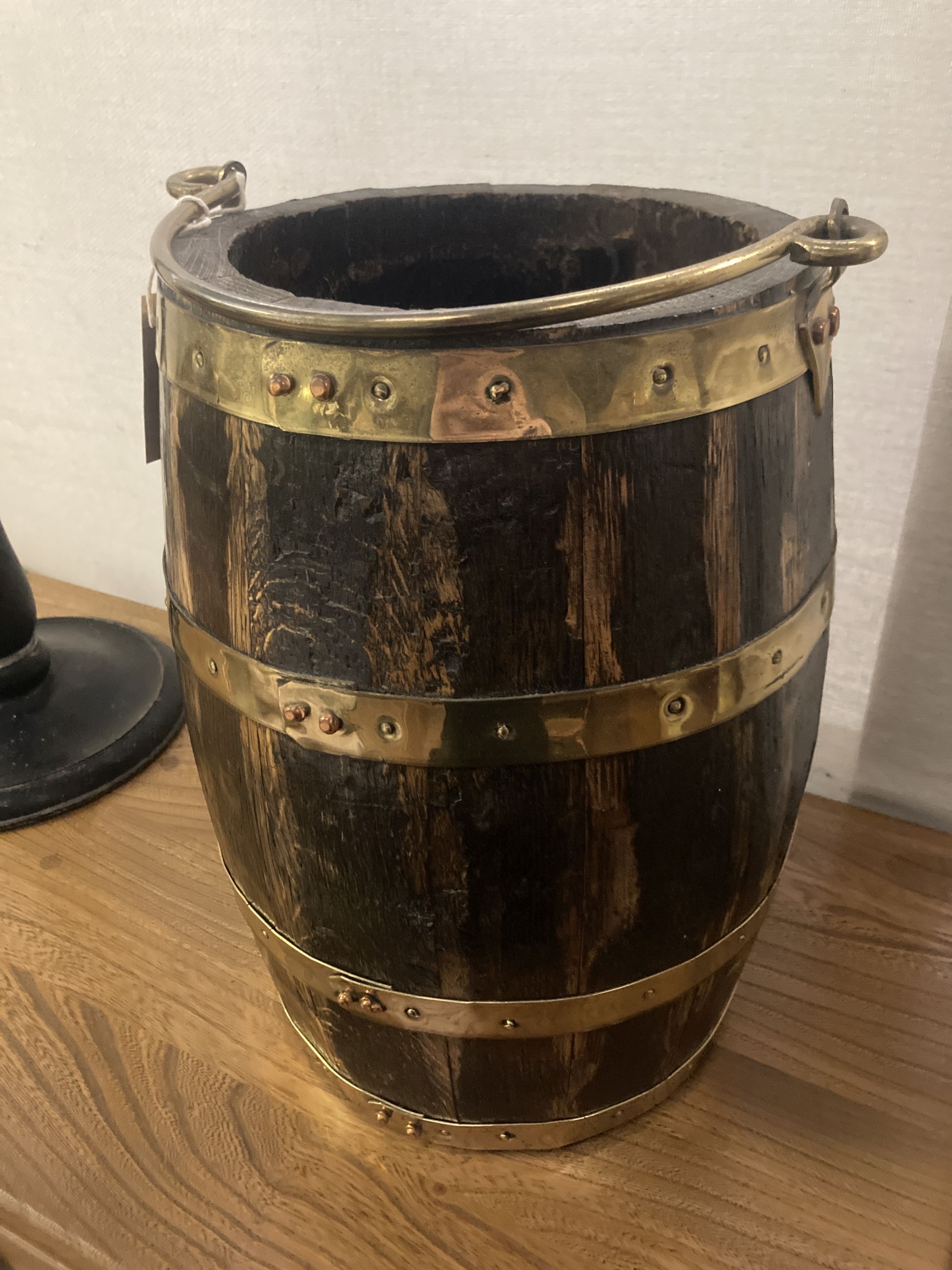 A brass bound staved wood bucket, diameter 26cm height 38cm